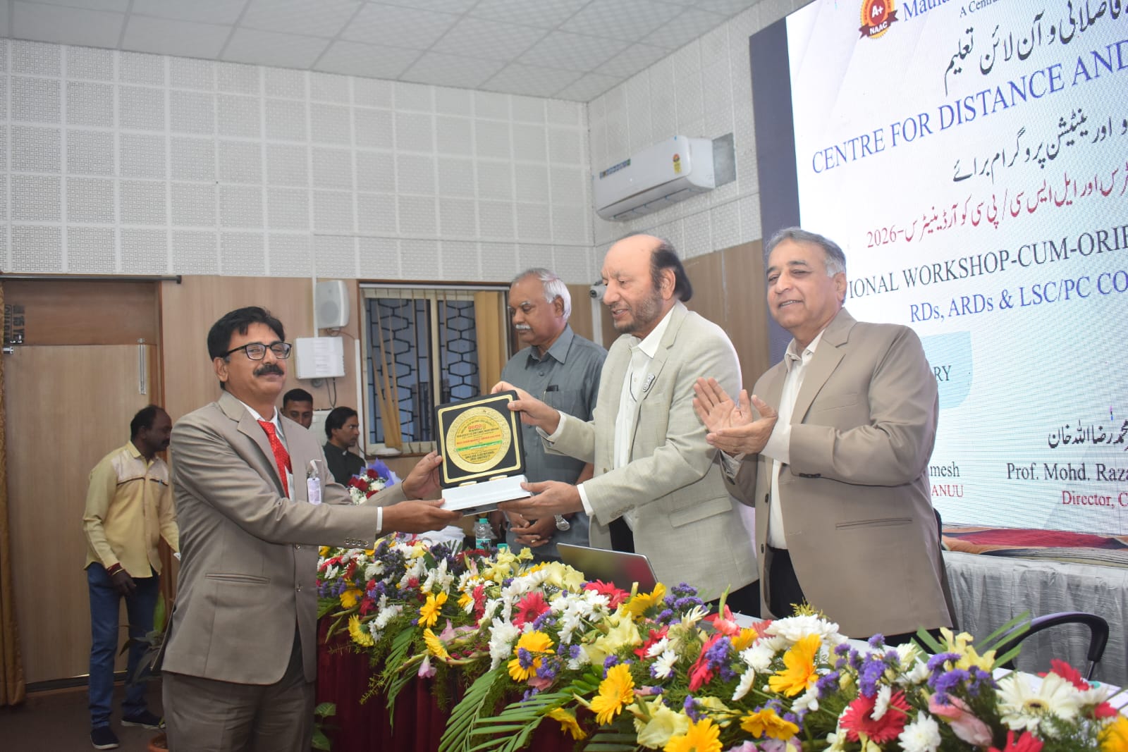 Dr Arif Pathan receiving the Award at Hyderabad   Maulana Azad College of Arts, Science & Commerce, Chhatrapati Sambhajinagar has been honoured with the Best Performance Award 2025–2026 by the Centre for Distance and Online Education (CDOE), MANUU, Hyderabad during the National Workshop-cum-Orientation Programme held on 12th & 13th January 2026.  ? The college was selected among the top 10 best-performing centres out of 153 across India, reflecting its outstanding contribution to admissions, outreach, and learner support.  ? The award also includes a cash prize of ₹25,000.  ? Congratulations to Sr Mazahar Farooqui (HoI) Dr Arif  Pathan(Coordinator) and the entire team for this national-level recognition!