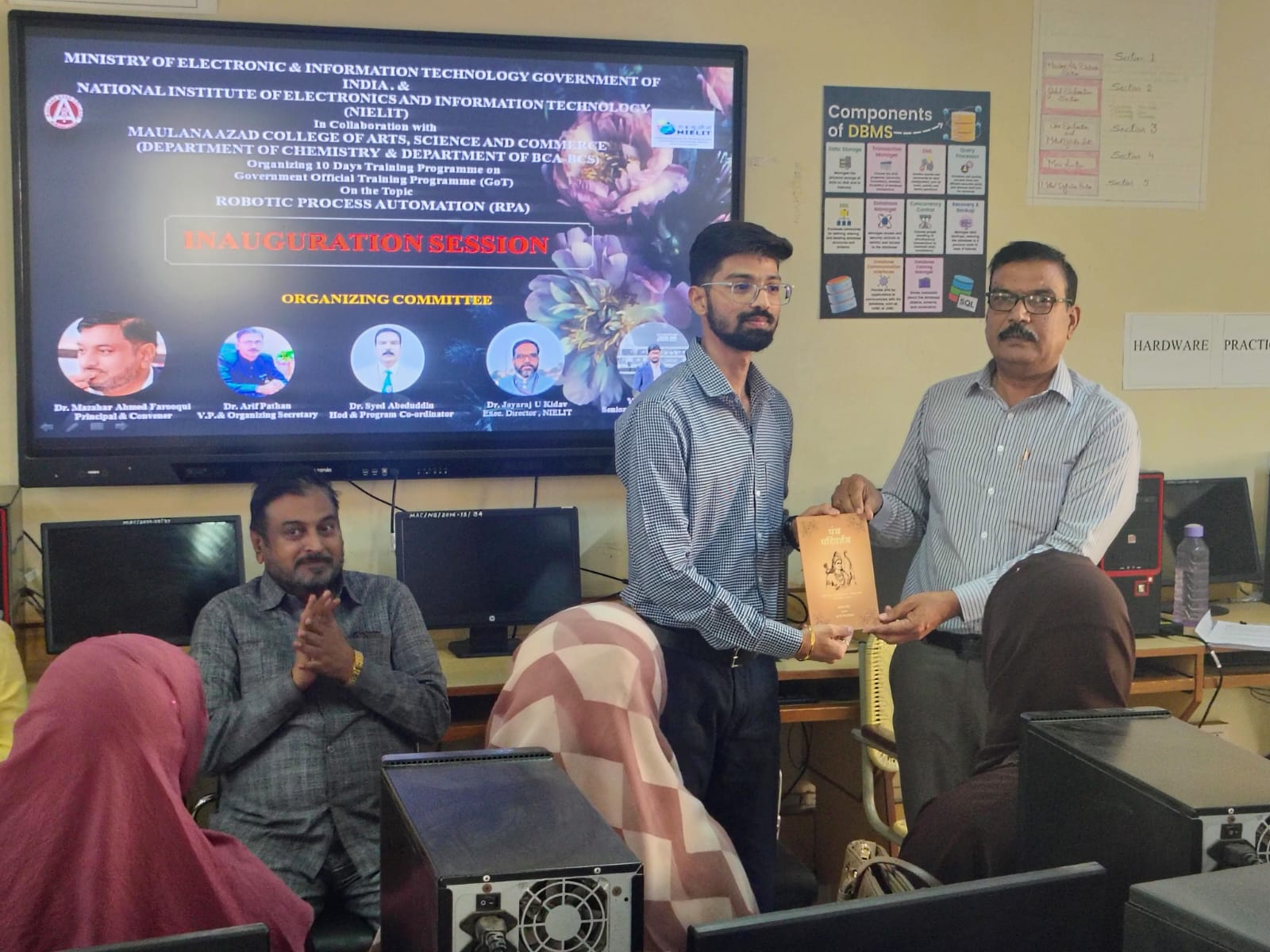 Today, Principal Dr. Mazahar Ahmed Farooqui inaugurated the Offline GoT-FDP on RPA Traning  Programme. He emphasized that AI and RPA automation are essential for faculty development and congratulated the Department of Chemistry and BCA/BCS for organizing such a useful GoT for staff.  On this occasion, Mr. Yogesh Shejwal NIELIT was felicitated by the Principal, and Mr. Maitrya Sardar NIELIT was felicitated by the HOD, Dr. Syed Abeduddin. The Principal expressed his pleasure at the full attendance and appreciated everyone’s participation.